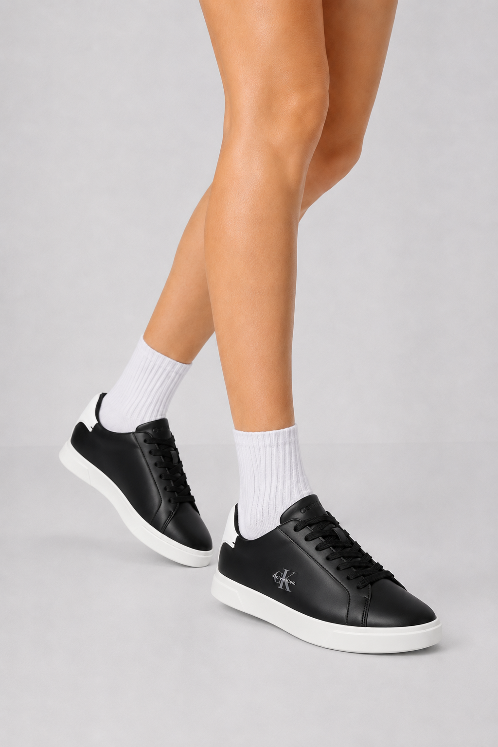 Дамски кецове Women’s sneakers Calvin Klein
HW0HW03146 0GM Black lifestyle view