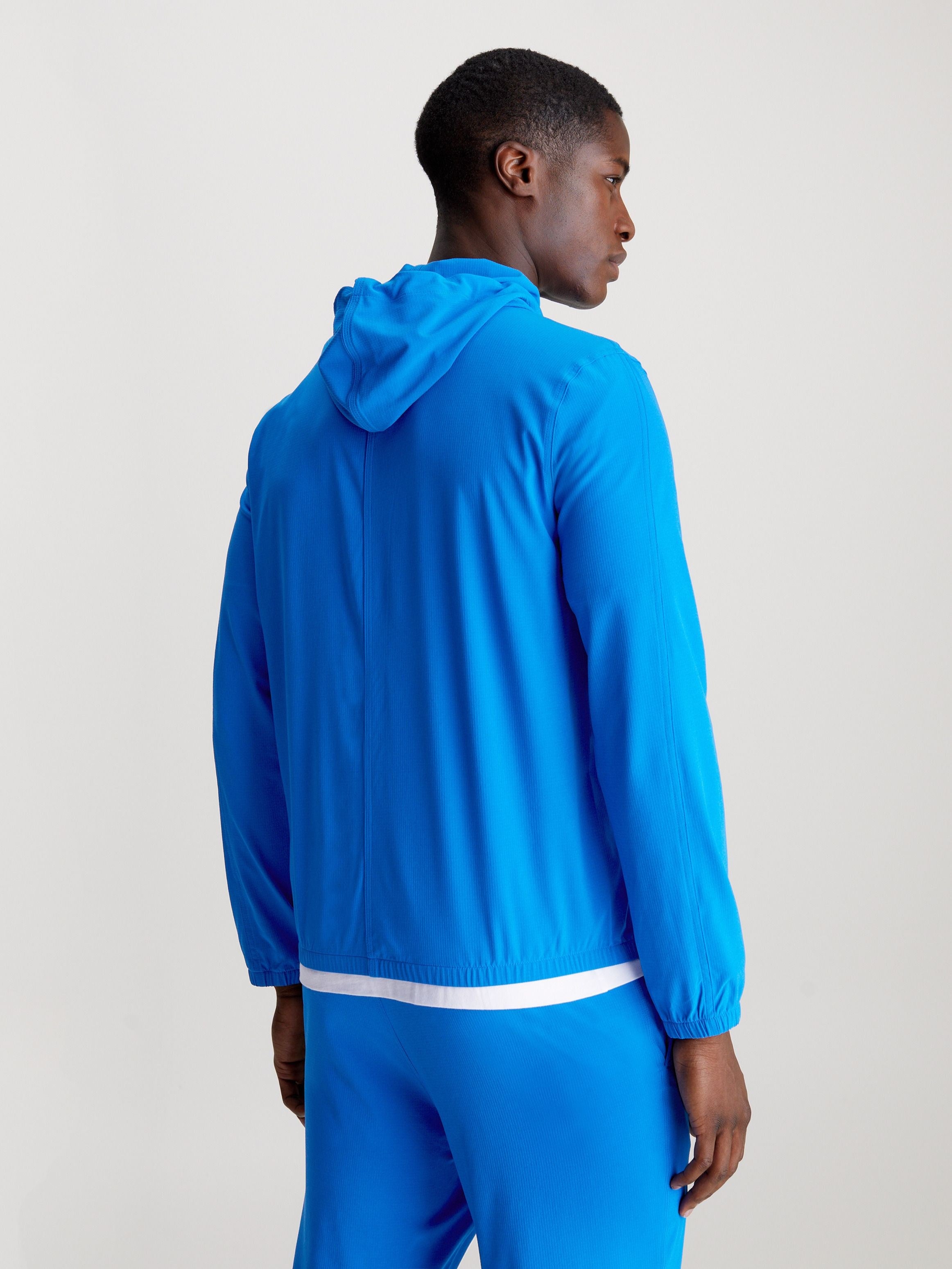 Мъжко яке ветровка Men’s wind stopper jacket Calvin Klein 00GMS4O520 CGN Blue back view